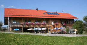 Гостиница Almcafe Schnakenhöhe  Ой-Миттельберг